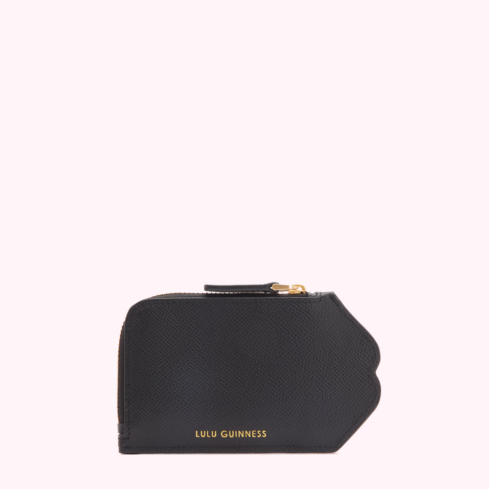 Black Lulu Guinness zip-around wallet against a white background.
