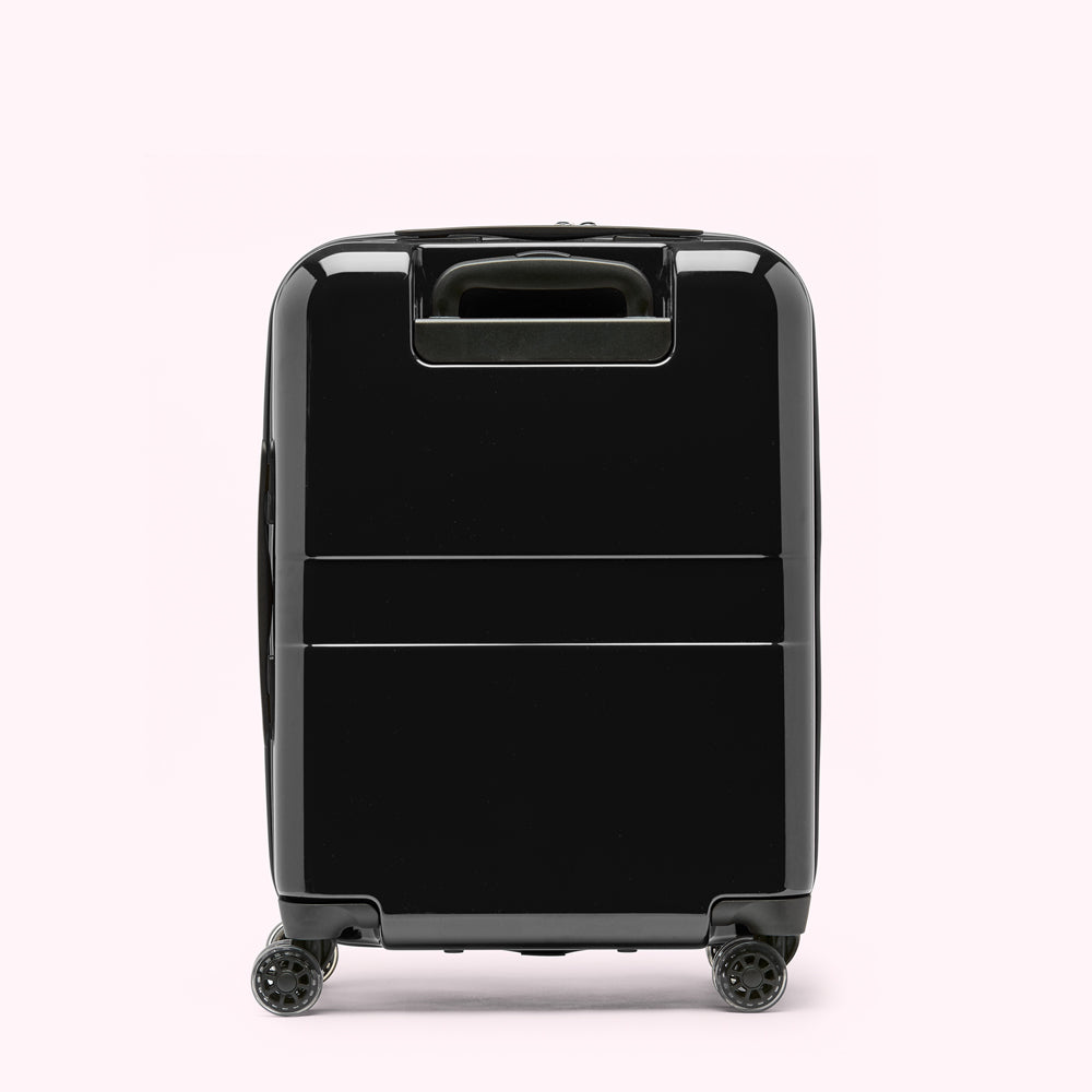 Black carry-on suitcase on white background.
