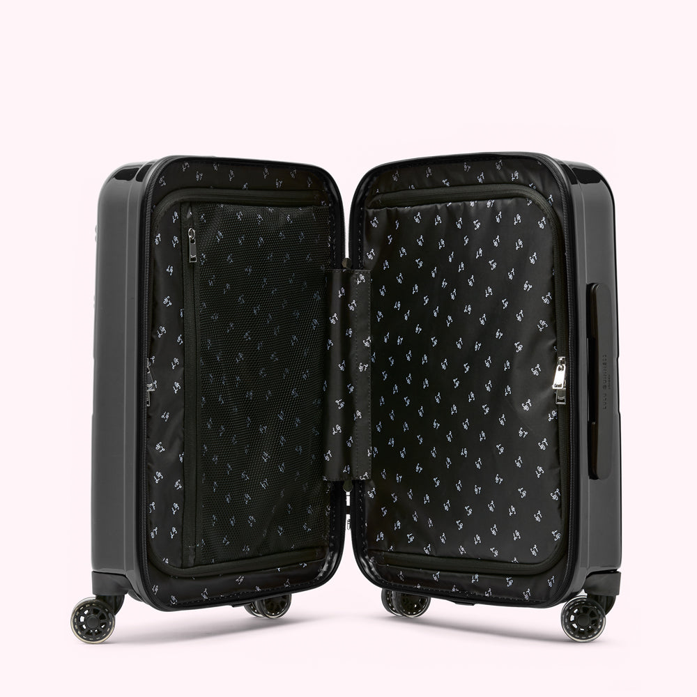 Open black carry-on suitcase with patterned lining.
