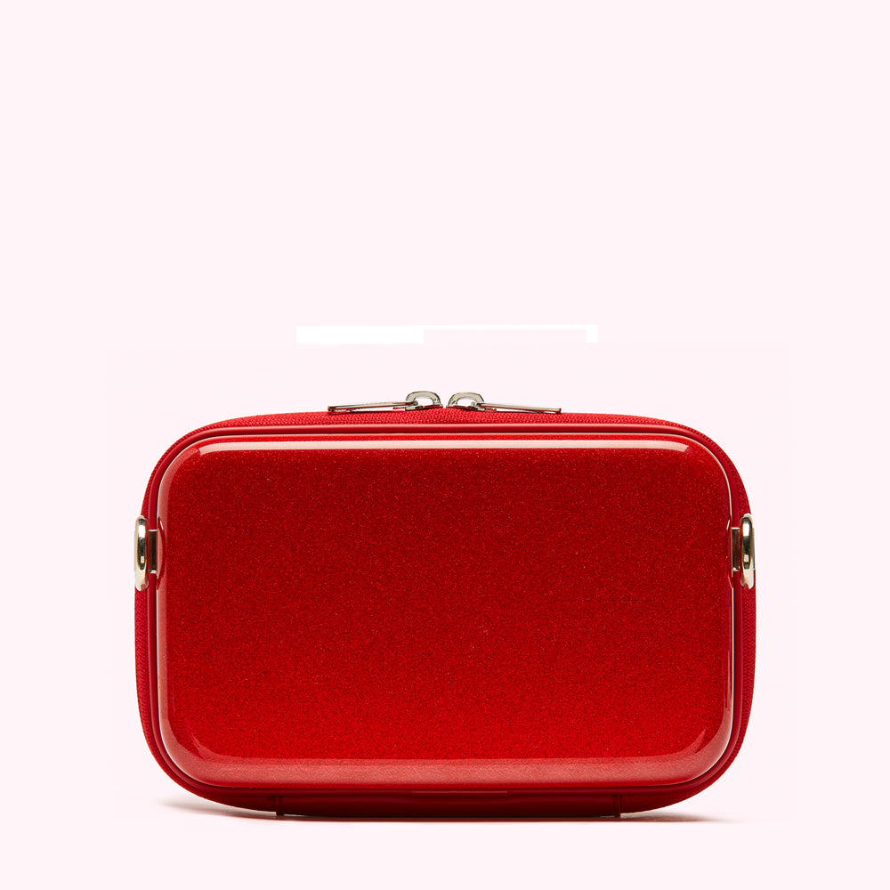 Red glitter cosmetic bag with silver zipper.
