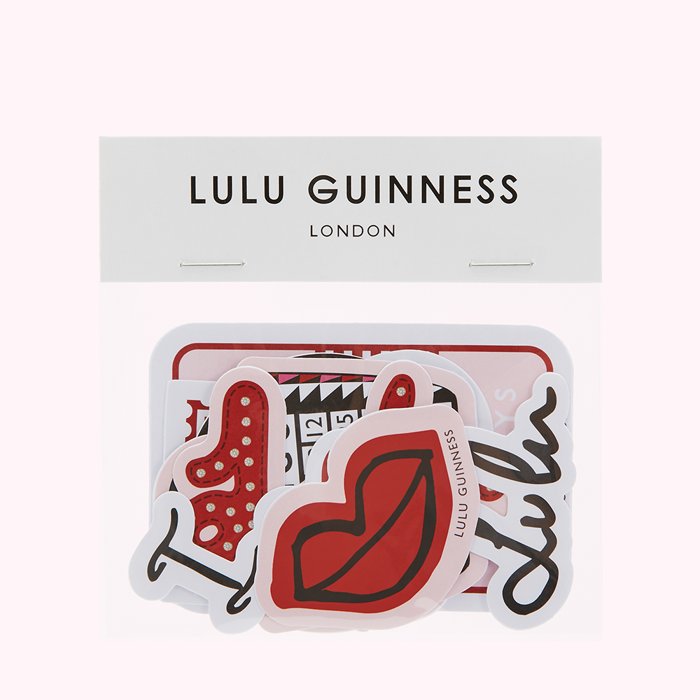 Lulu Guinness London sticker sheet featuring a red lip, numbers, and other designs.