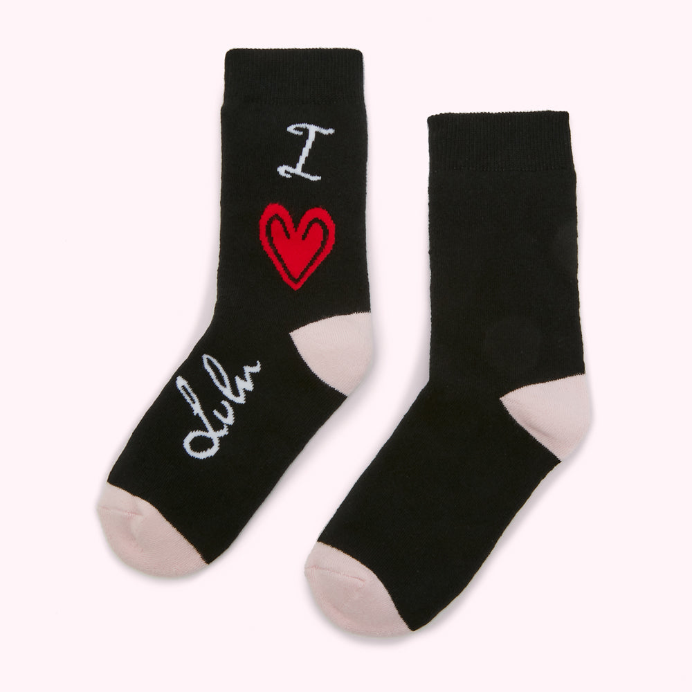 Pair of black ankle socks with a pink heel and toe; one sock features "I heart Dublin" in white and red.