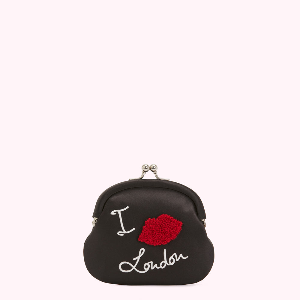 Black satin coin purse with "I love London" embroidered on it and a red lip detail.

