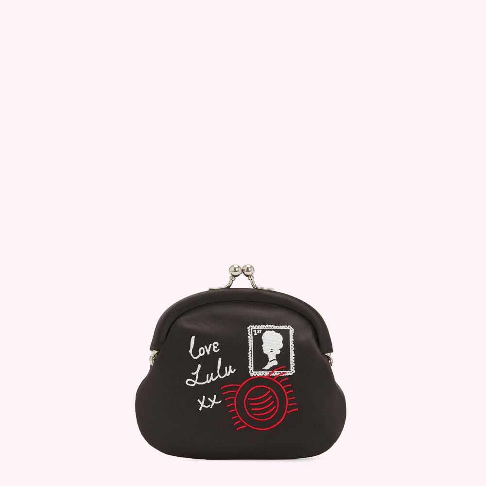 Black satin coin purse with embroidered design; "Love Lulu xx", a postage stamp and postmark.
