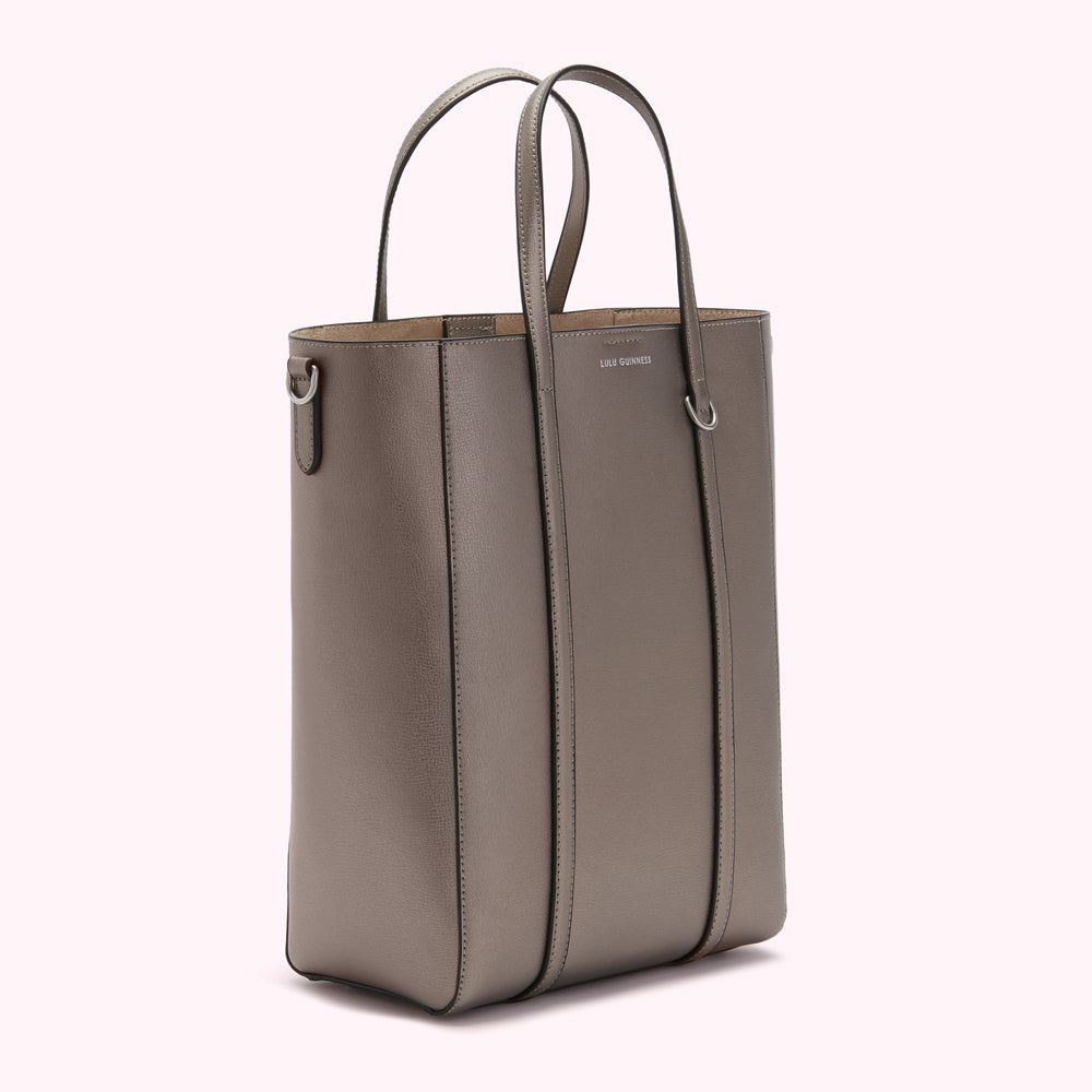 A grey Lulu Guinness tote bag with two top handles and a detachable shoulder strap.
