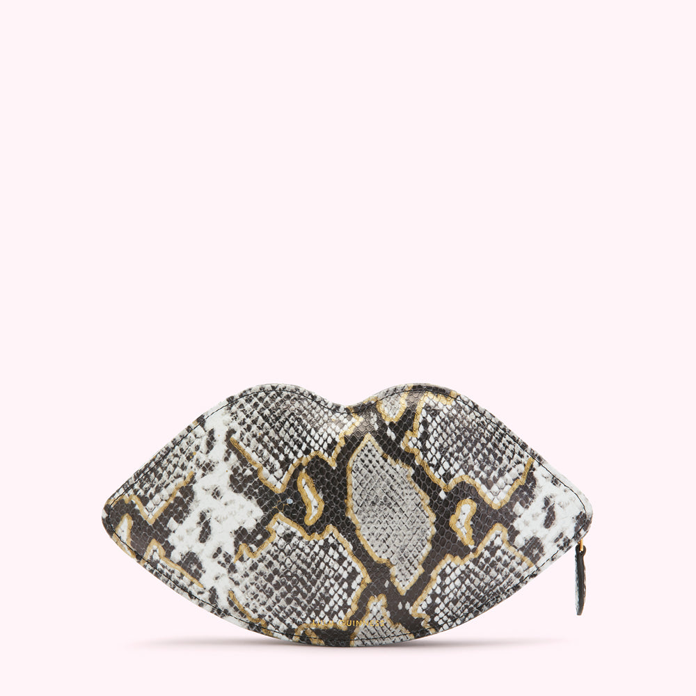 Snakeskin-print lip-shaped clutch with a zipper. The background is white.
