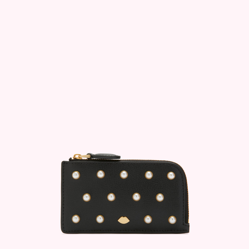 Black leather zip-around cardholder adorned with pearl accents against a white background.
