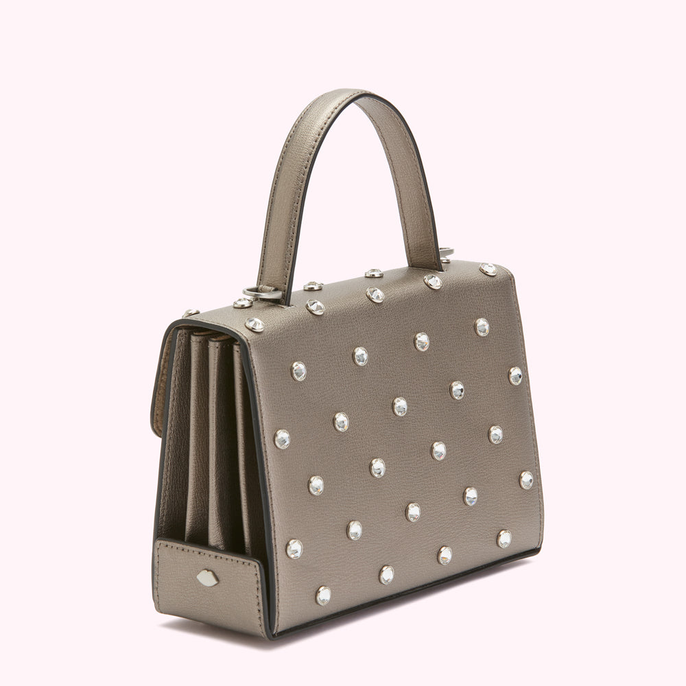 Silver metallic handbag with crystal embellishments.
