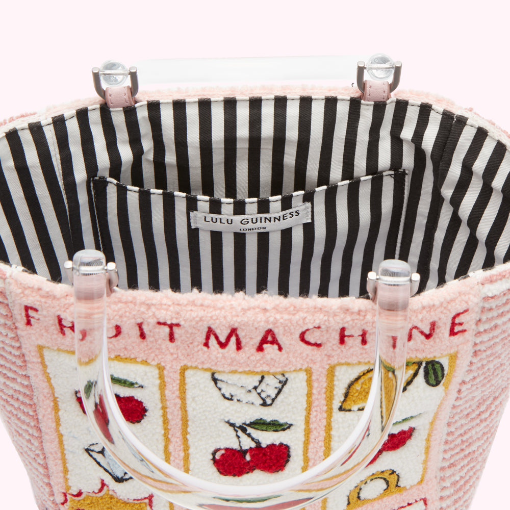 Pink Lulu Guinness Fruit Machine tote bag with clear Perspex handles, black and white striped interior.
