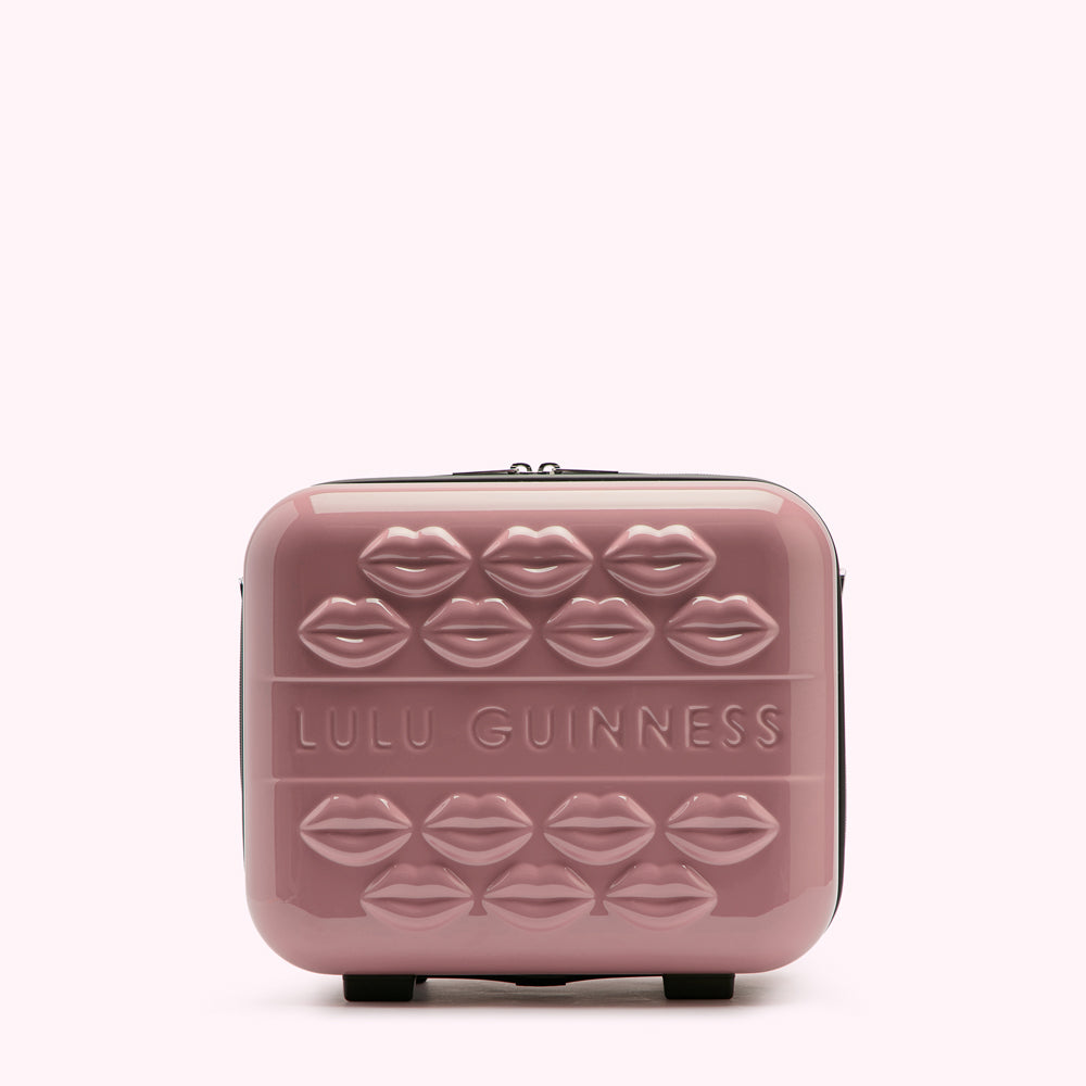 Pink Lulu Guinness Lips suitcase.
