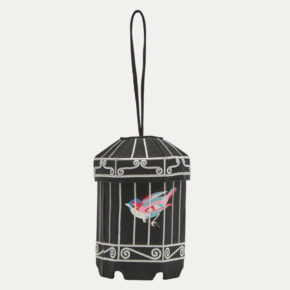 Black birdcage-shaped bag with embroidered bird.