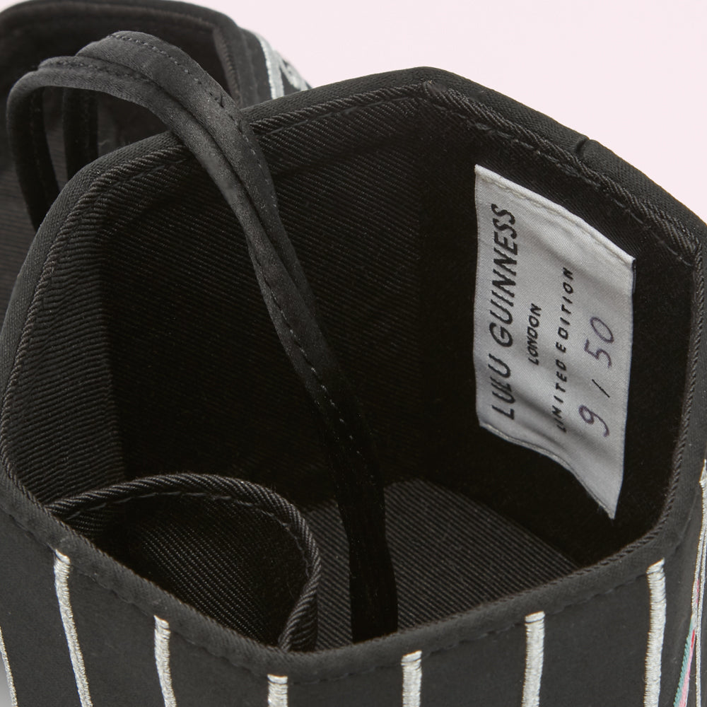 BLACK BIRDCAGE COLLECTIBLES CLUTCH BAG