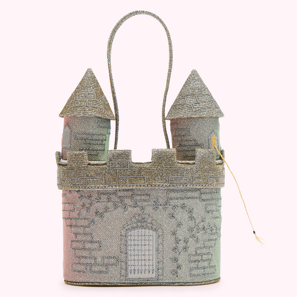 A silver glitter castle-shaped handbag with a top handle and a small yellow drawbridge detail.