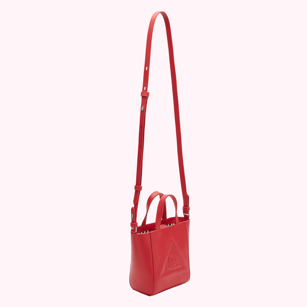Red leather crossbody bag with embossed logo.
