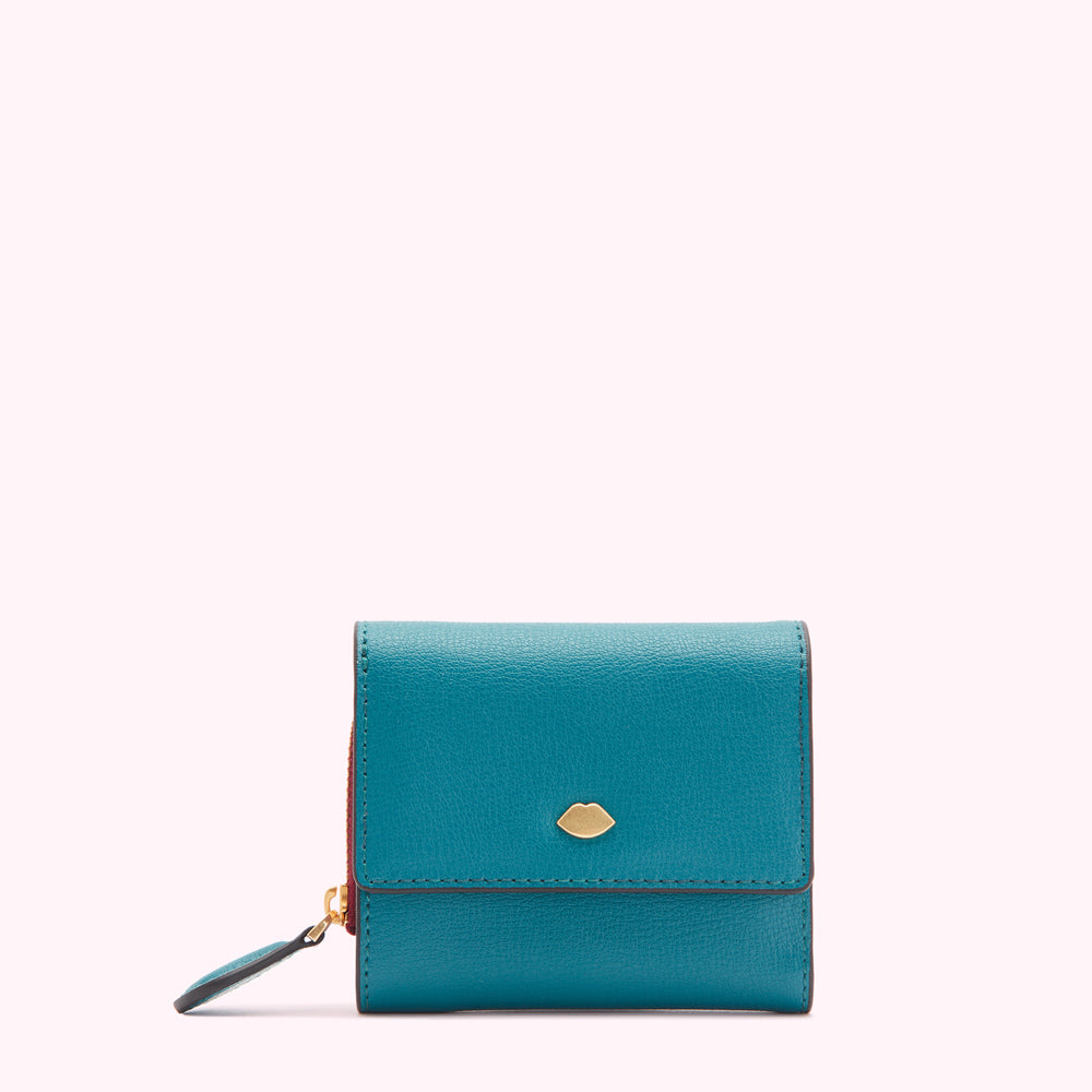 Teal leather wallet with gold lip detail and zip closure against a white background.
