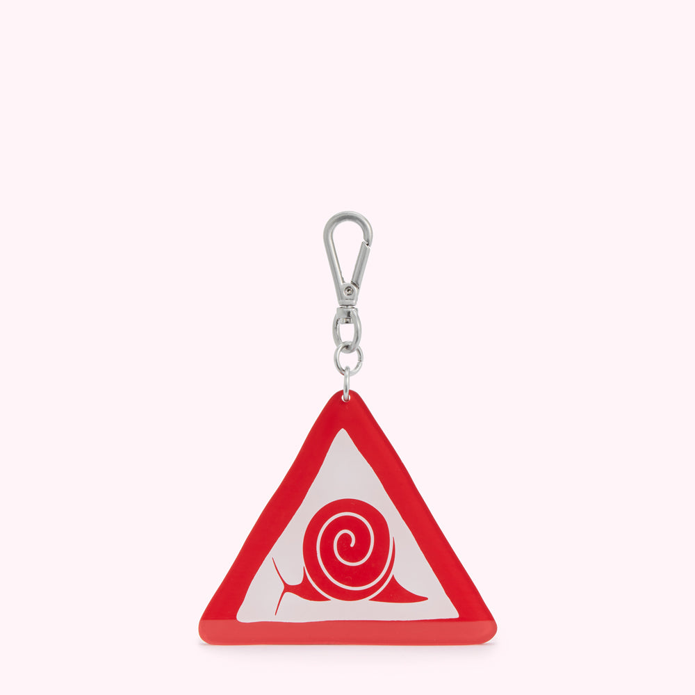 Red triangular keychain with a silver clasp, featuring a white interior and a red snail graphic.
