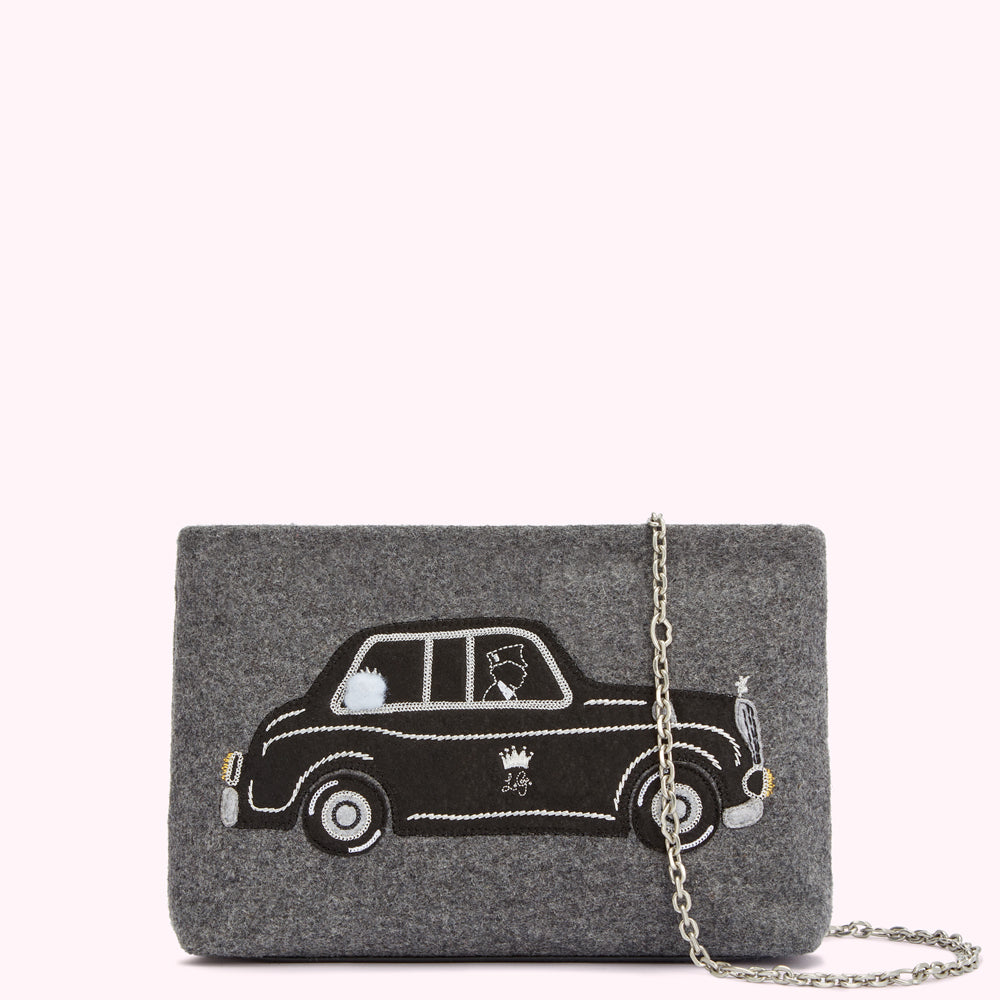 Grey felt clutch with embroidered black cab design and silver chain strap.
