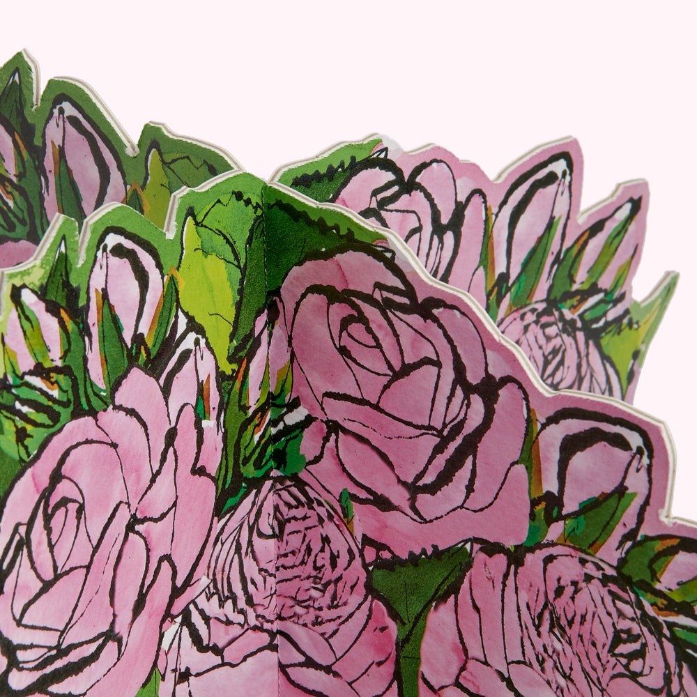 Close-up of a pink and green floral illustration with a scalloped edge.