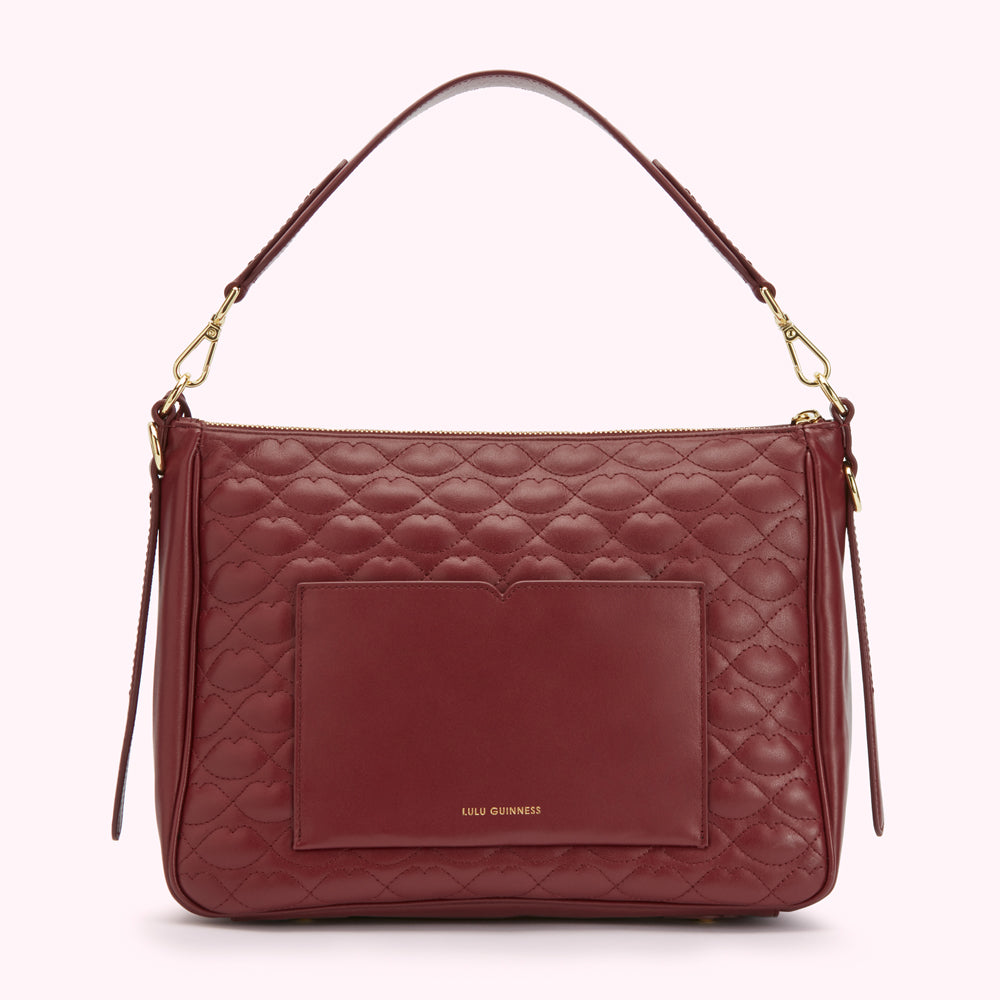 Burgundy quilted leather Lulu Guinness shoulder bag with a front pocket.