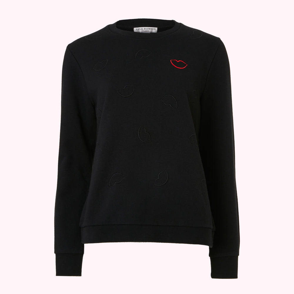 Black Lulu Guinness sweatshirt with red lip design.