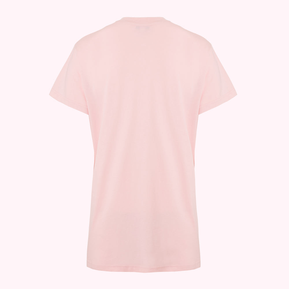 Back view of a plain light pink t-shirt on a white background.
