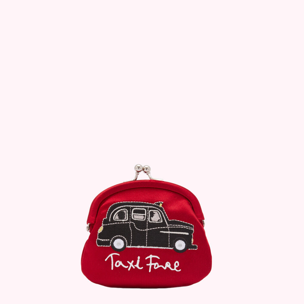 Red satin purse with embroidered black London taxi cab and "Taxi Fare" text.
